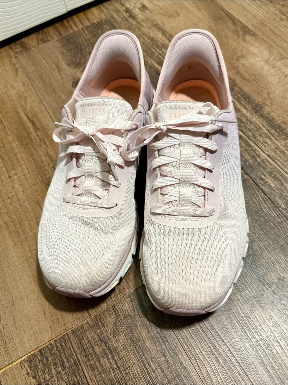 Light Pink Women's Glide-Step slip in Skechers